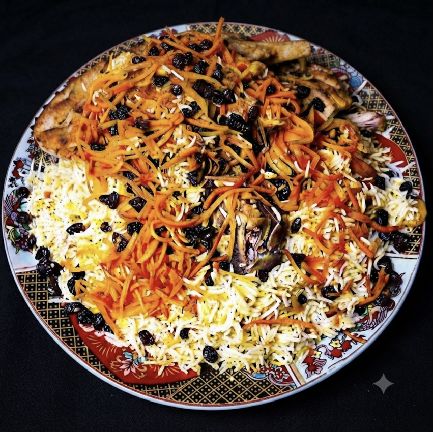 Qabuli Palaw - Afghanistan's national dish with chicken, carrots and raisins on basmati rice